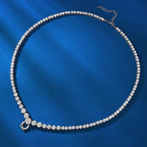 A versatile, high-end necklace with a full diamond clasp and a multi-purpose chain. It features a unique design and a sophisticated, understated style.